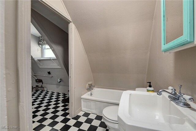 4465 Oberlin Ave, Lorain, OH 44053 - bathroom featuring tile patterned floors and a garden tub