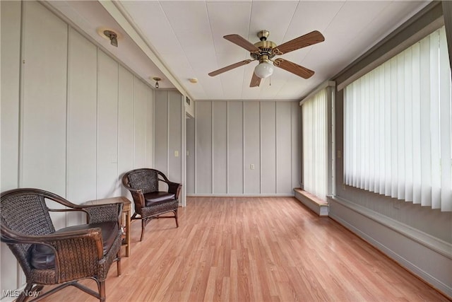 4465 Oberlin Ave, Lorain, OH 44053 - living area featuring light wood-style flooring and ceiling fan