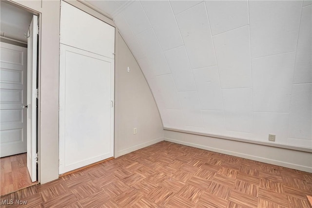4465 Oberlin Ave, Lorain, OH 44053 - unfurnished bedroom with lofted ceiling and baseboards