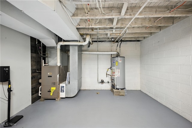 77 W Park Ave, Hubbard, OH 44425 - unfinished below grade area featuring gas water heater, heating unit, and concrete block wall
