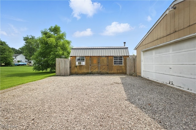 77 W Park Ave, Hubbard, OH 44425 - garage featuring driveway