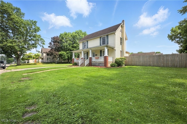 77 W Park Ave, Hubbard, OH 44425 - view of front of home with covered porch and a chimney