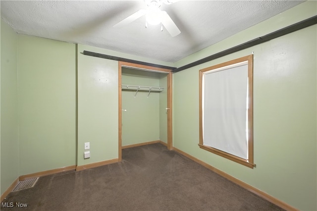 77 W Park Ave, Hubbard, OH 44425 - unfurnished bedroom with a textured ceiling, carpet floors, a closet, and ceiling fan