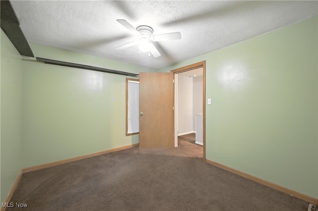 77 W Park Ave, Hubbard, OH 44425 - carpeted spare room with ceiling fan and a textured ceiling