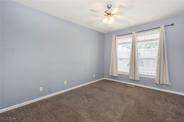 101 Stonegate Cir, Seven Hills, OH 44131 - unfurnished room with dark carpet and ceiling fan