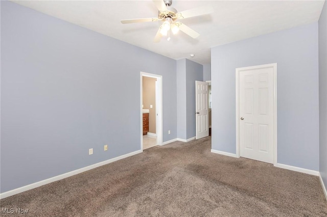 101 Stonegate Cir, Seven Hills, OH 44131 - unfurnished bedroom with carpet flooring, ensuite bathroom, and ceiling fan