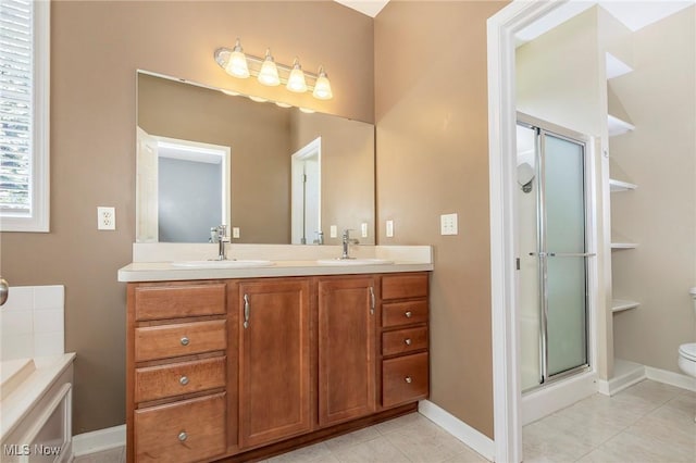 101 Stonegate Cir, Seven Hills, OH 44131 - bathroom featuring a shower stall, double vanity, tile patterned floors, and a bathtub