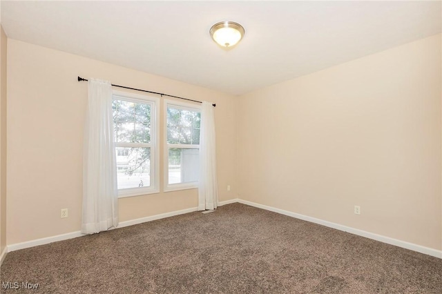 101 Stonegate Cir, Seven Hills, OH 44131 - carpeted empty room featuring baseboards