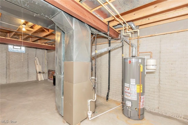 101 Stonegate Cir, Seven Hills, OH 44131 - basement featuring gas water heater, heating unit, and brick wall