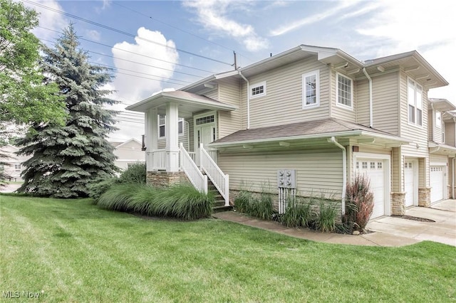 101 Stonegate Cir, Seven Hills, OH 44131 - view of front of home with a garage, a front lawn, driveway, and stone siding