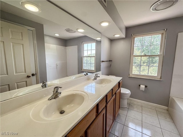 38 Lake Dr, Parkersburg, WV 26104 - bathroom featuring plenty of natural light, double vanity, recessed lighting, and tile patterned floors