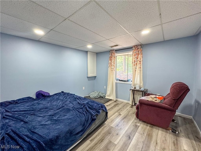 38 Lake Dr, Parkersburg, WV 26104 - bedroom with light wood-type flooring, recessed lighting, and a paneled ceiling