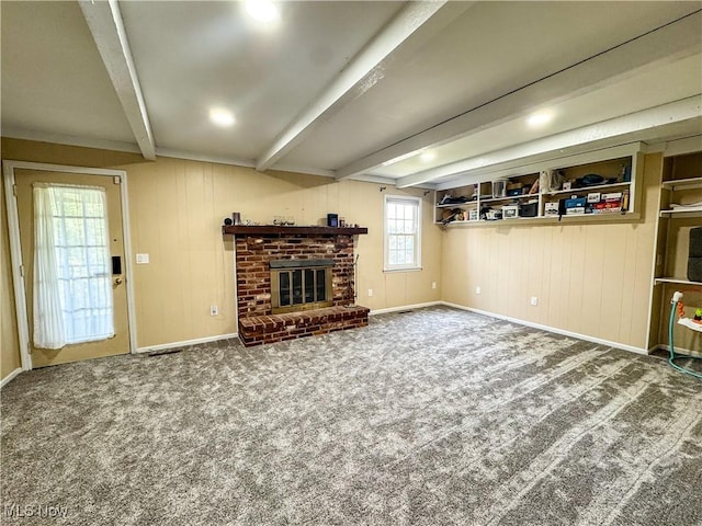 38 Lake Dr, Parkersburg, WV 26104 - unfurnished living room featuring beam ceiling, a fireplace, carpet flooring, and wood walls