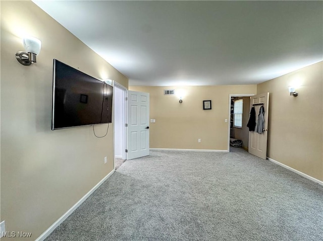 38 Lake Dr, Parkersburg, WV 26104 - unfurnished living room featuring baseboards and carpet flooring