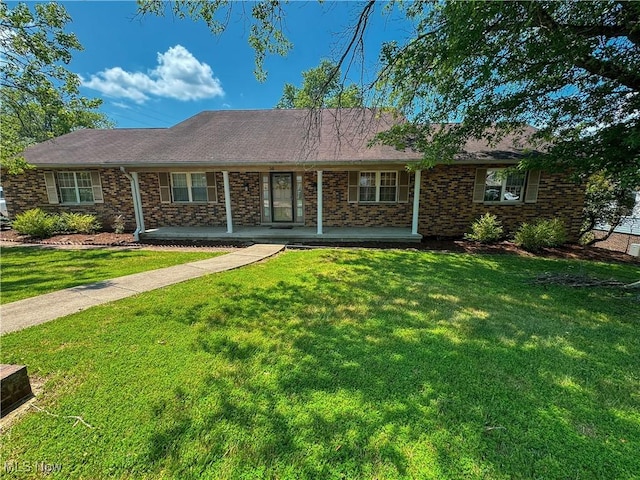 38 Lake Dr, Parkersburg, WV 26104 - single story home with a front lawn, a porch, and brick siding