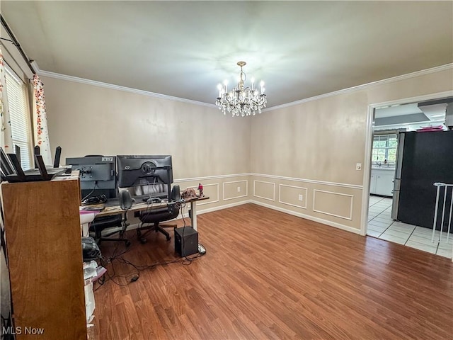 38 Lake Dr, Parkersburg, WV 26104 - office space featuring crown molding, wood finished floors, a chandelier, a decorative wall, and wainscoting