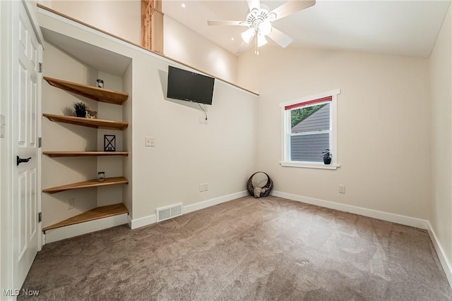 24690 Hawthorne Dr, Euclid, OH 44117 - carpeted empty room with a ceiling fan and vaulted ceiling