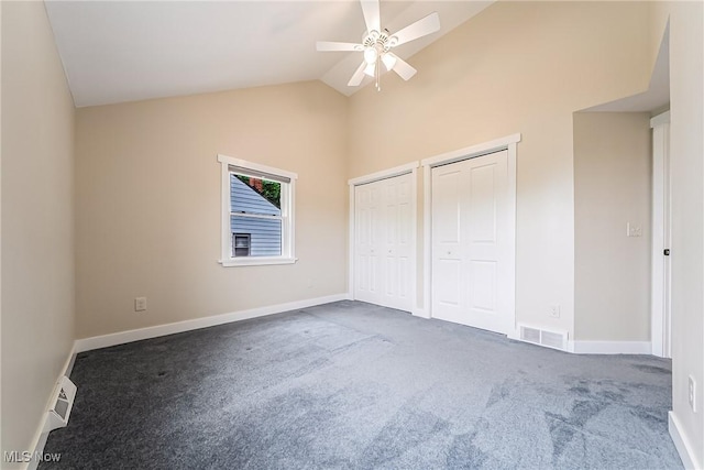24690 Hawthorne Dr, Euclid, OH 44117 - unfurnished bedroom featuring multiple closets, carpet, high vaulted ceiling, and ceiling fan