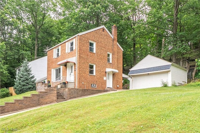 24690 Hawthorne Dr, Euclid, OH 44117 - view of front facade with a chimney, a garage, a front lawn, and brick siding