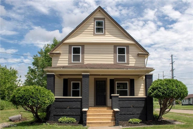 2951 Toledo Ave, Lorain, OH 44055 - view of front of home with covered porch and brick siding