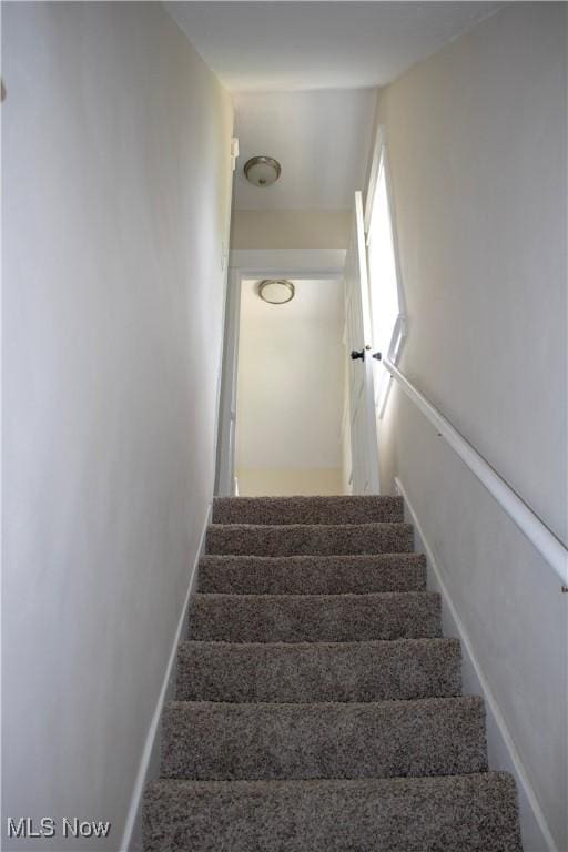 2951 Toledo Ave, Lorain, OH 44055 - staircase with baseboards