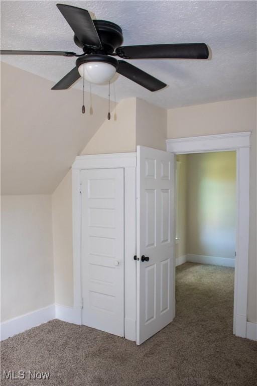 2951 Toledo Ave, Lorain, OH 44055 - bonus room featuring carpet, a ceiling fan, and a textured ceiling
