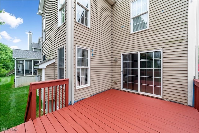 4877 Highland Place Ct, Richmond Heights, OH 44143 - wooden deck featuring a sunroom and a lawn