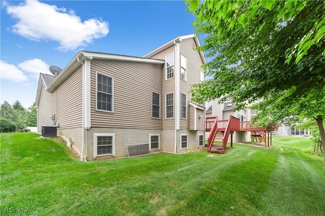 4877 Highland Place Ct, Richmond Heights, OH 44143 - rear view of house with stairs, a lawn, and a wooden deck