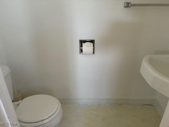 120 Braxton Rd, Weirton, WV 26062 - half bathroom featuring toilet and baseboards