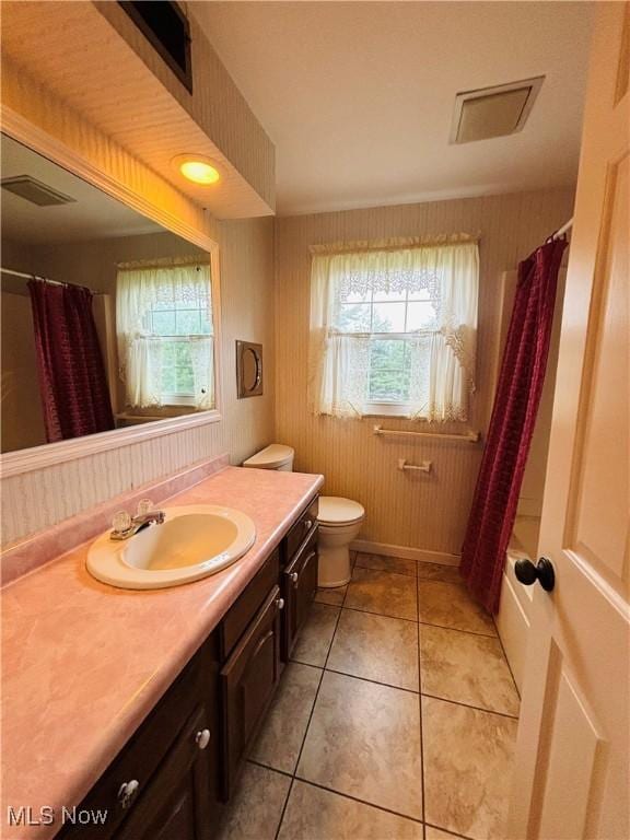 224 N Hills Dr, Parkersburg, WV 26104 - bathroom featuring vanity, tile patterned flooring, and shower / tub combo