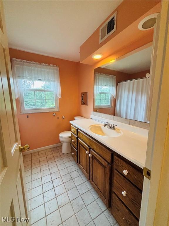 224 N Hills Dr, Parkersburg, WV 26104 - bathroom featuring vanity, plenty of natural light, and tile patterned flooring
