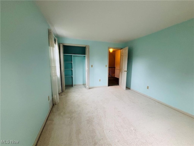 224 N Hills Dr, Parkersburg, WV 26104 - unfurnished bedroom featuring a closet and light carpet
