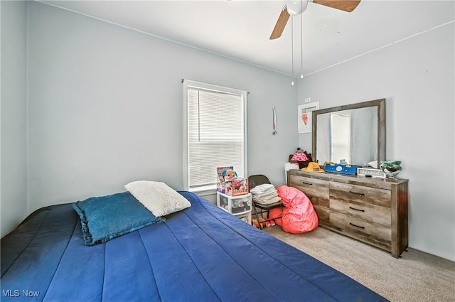 565 12th St, Campbell, OH 44405 - carpeted bedroom featuring a ceiling fan