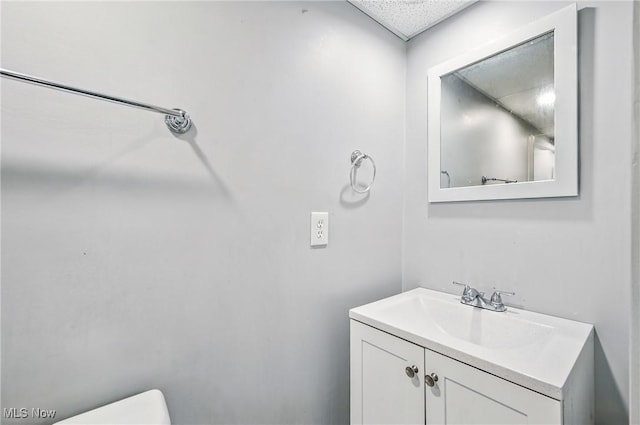 565 12th St, Campbell, OH 44405 - bathroom featuring vanity and toilet