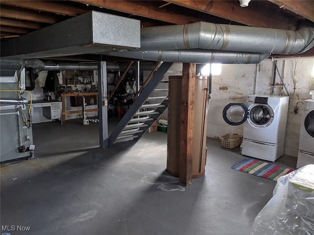 7 W Main St, Savannah, OH 44874 - below grade area with washer and dryer, stairs, and heating unit