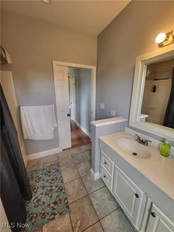 54856 Winding Hill Rd, Bellaire, OH 43906 - bathroom featuring vanity and tile patterned flooring