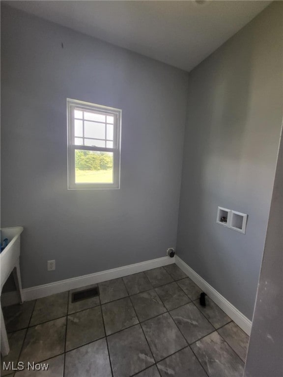 54856 Winding Hill Rd, Bellaire, OH 43906 - laundry room featuring washer hookup and baseboards