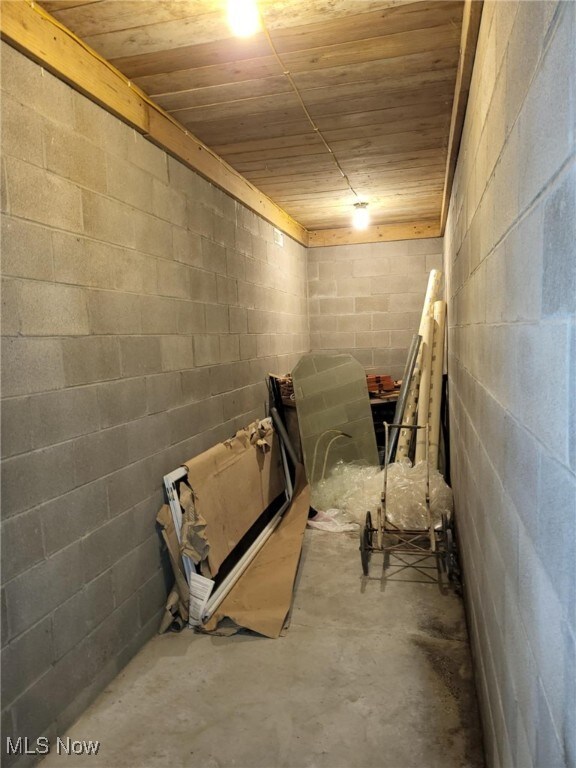 54856 Winding Hill Rd, Bellaire, OH 43906 - basement with concrete block wall and wooden ceiling