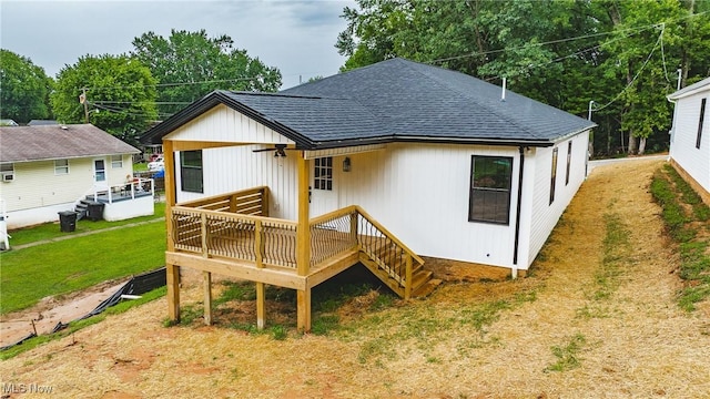 1404 15th St, Vienna, WV 26105 - rear view of property with a shingled roof, a deck, and a yard