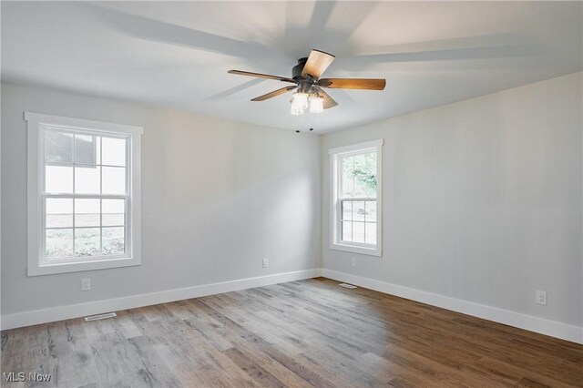 1404 15th St, Vienna, WV 26105 - unfurnished room with wood finished floors and a ceiling fan