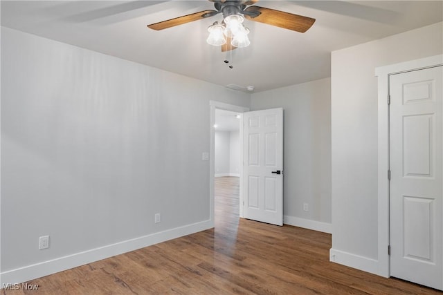 1404 15th St, Vienna, WV 26105 - spare room featuring ceiling fan and wood finished floors