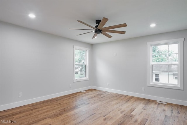 1404 15th St, Vienna, WV 26105 - unfurnished room with healthy amount of natural light, ceiling fan, light wood-style flooring, and recessed lighting