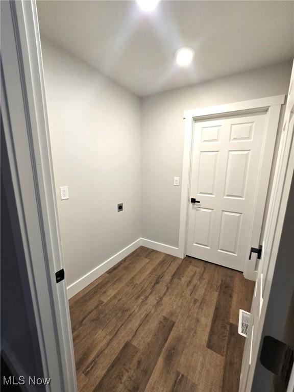 1404 15th St, Vienna, WV 26105 - laundry room with dark wood finished floors, electric dryer hookup, and recessed lighting
