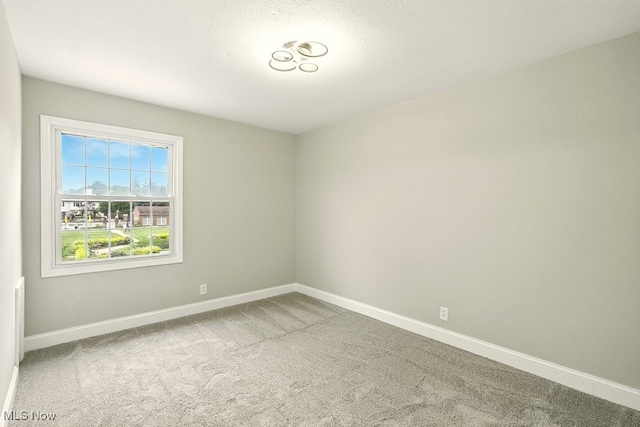 5830 Spotswood Dr, Lyndhurst, OH 44124 - carpeted empty room featuring baseboards