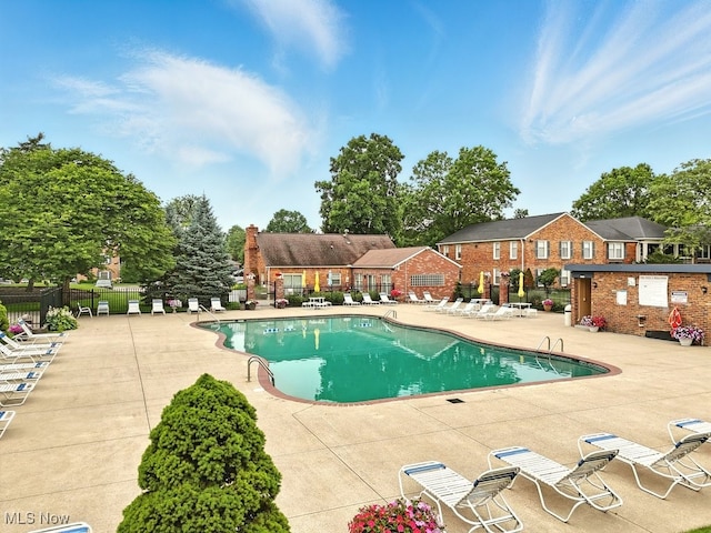 5830 Spotswood Dr, Lyndhurst, OH 44124 - community pool featuring a patio