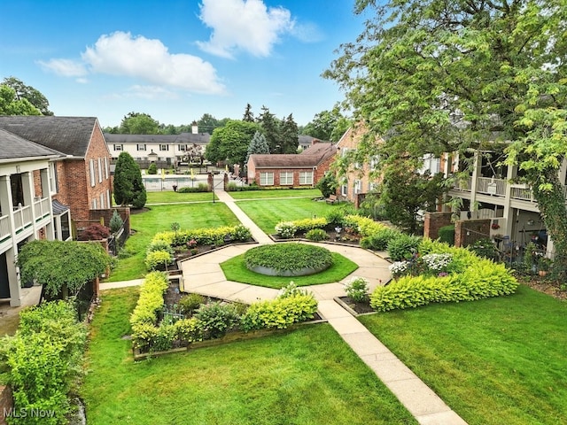 5830 Spotswood Dr, Lyndhurst, OH 44124 - view of home's community featuring a lawn