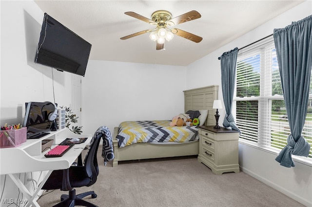 313 Crimson Cir, Campbell, OH 44405 - bedroom featuring light colored carpet, multiple windows, and ceiling fan