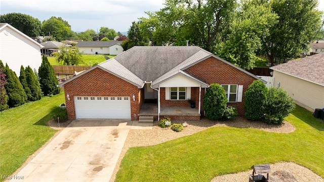 313 Crimson Cir, Campbell, OH 44405 - ranch-style house featuring brick siding, a garage, concrete driveway, a porch, and roof with shingles