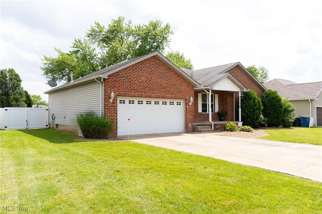 313 Crimson Cir, Campbell, OH 44405 - ranch-style home with a gate, an attached garage, driveway, brick siding, and a porch