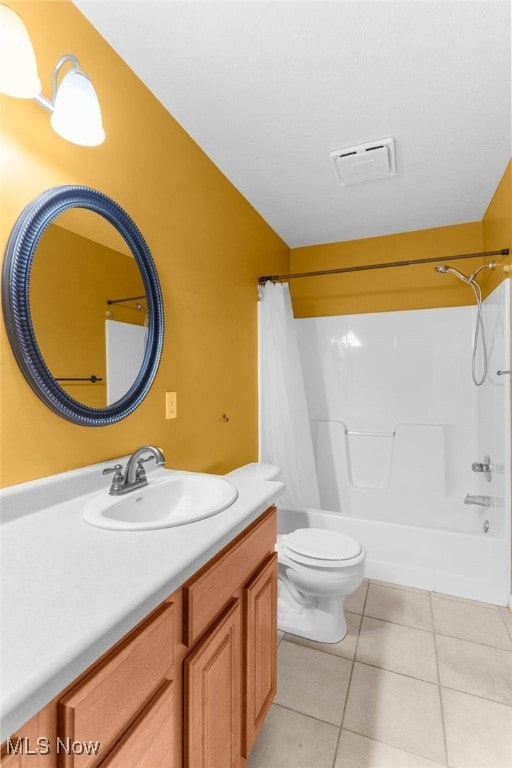 313 Crimson Cir, Campbell, OH 44405 - bathroom with vanity, shower / bathtub combination with curtain, and tile patterned flooring